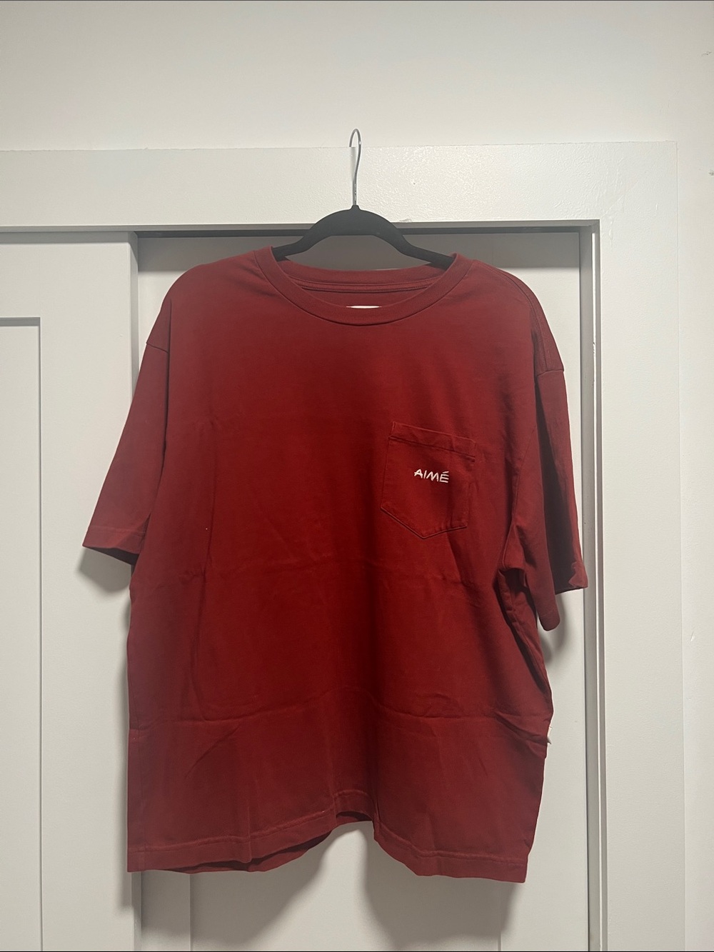 Aime Leon Dore red crewneck tee with chest label